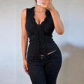 VINTAGE black ruffle sleeveless blouse top