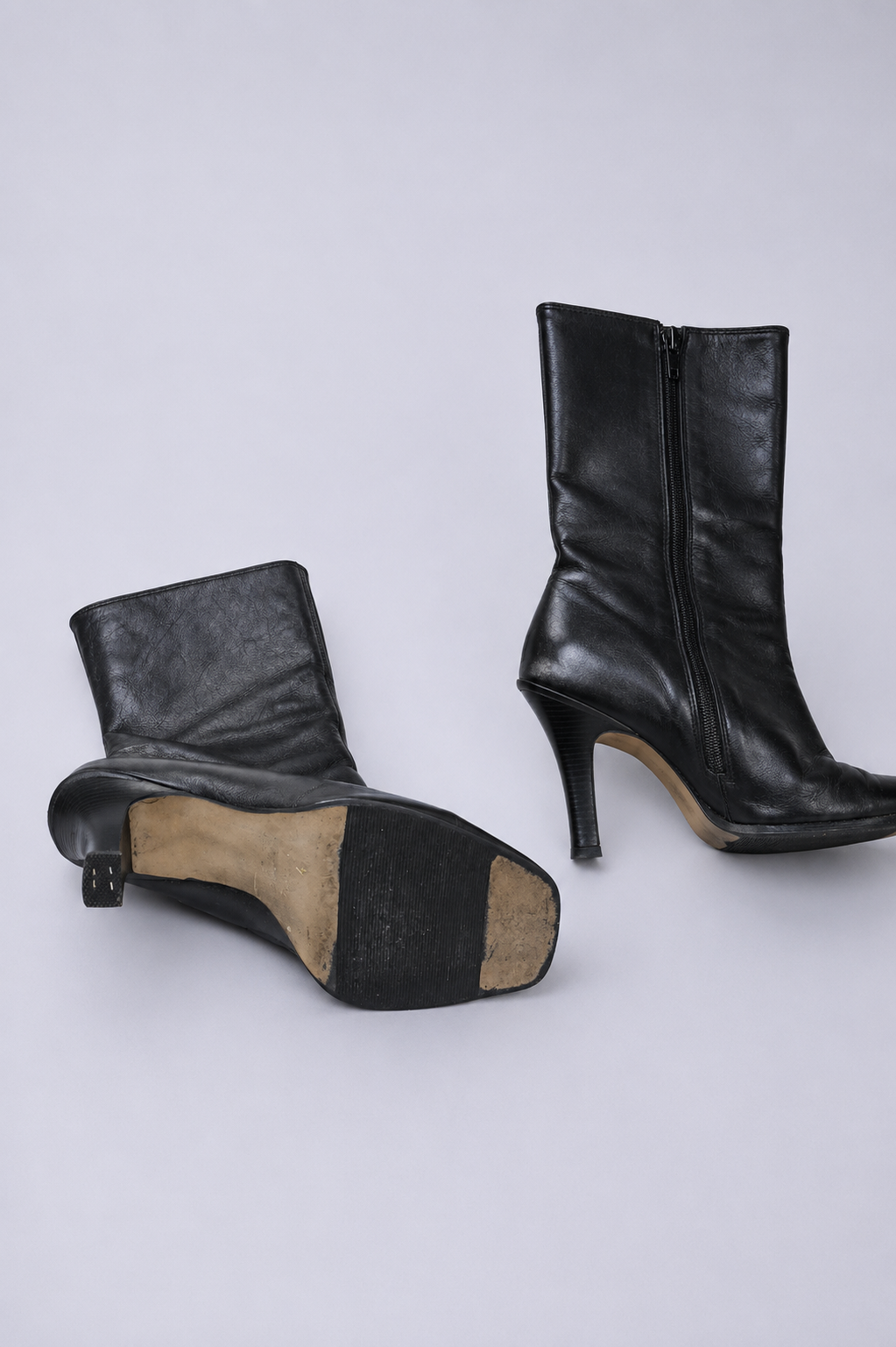 Vintage black heeled boots