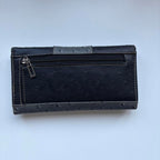 VINTAGE GUESS purse with G logo on the front and polka dot pattern made from leather 90s designer