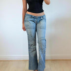 VINTAGE Blue low rise flared denim jeans