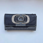 VINTAGE GUESS purse with G logo on the front and polka dot pattern made from leather 90s designer