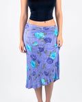 Vintage low rise purple floral knit midi skirt with an asymmetrical hem